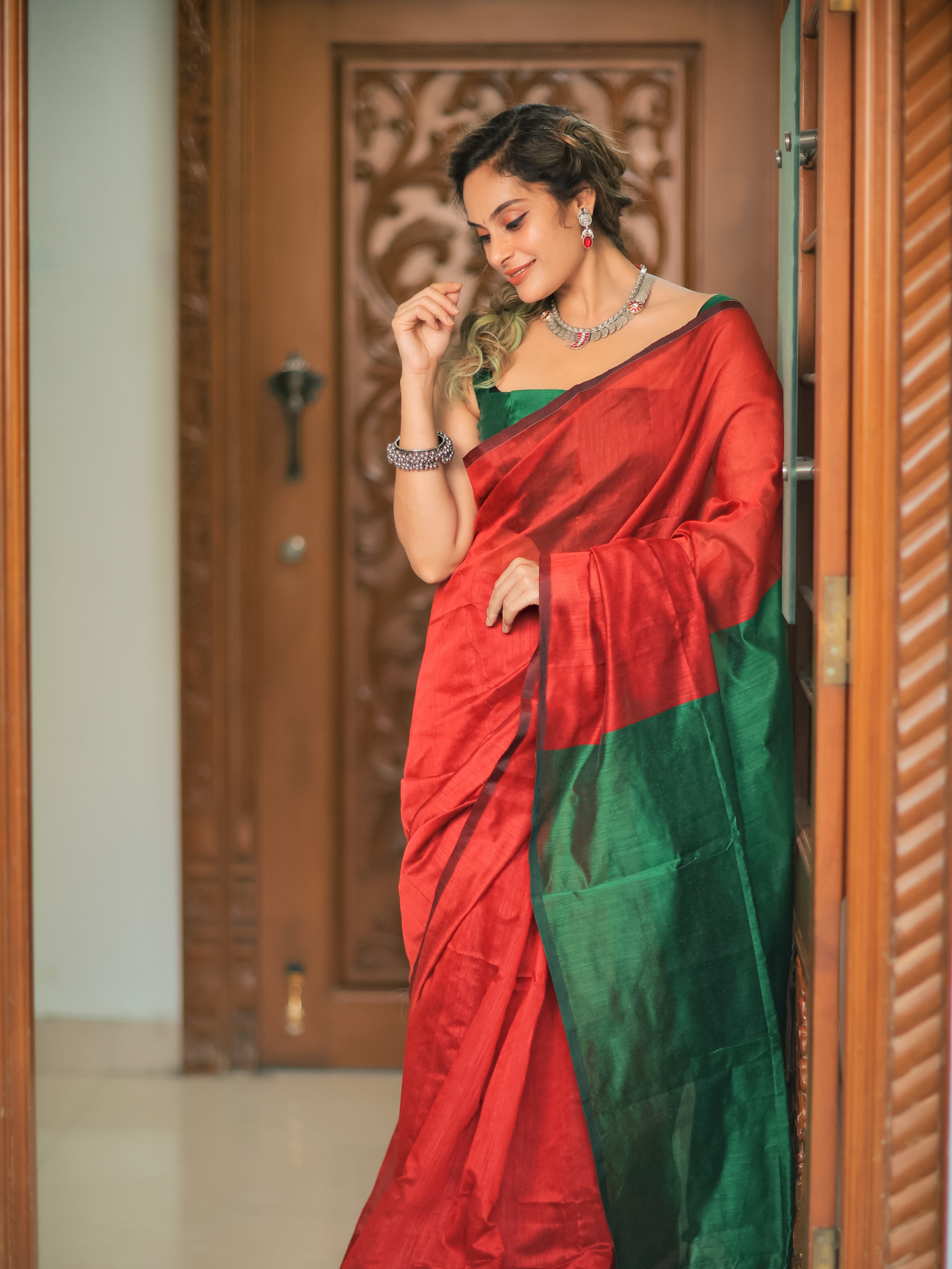 Red Color Soft Banarasi Silk Saree with Green Blouse and Golden Zari Work -  Navshtri Family