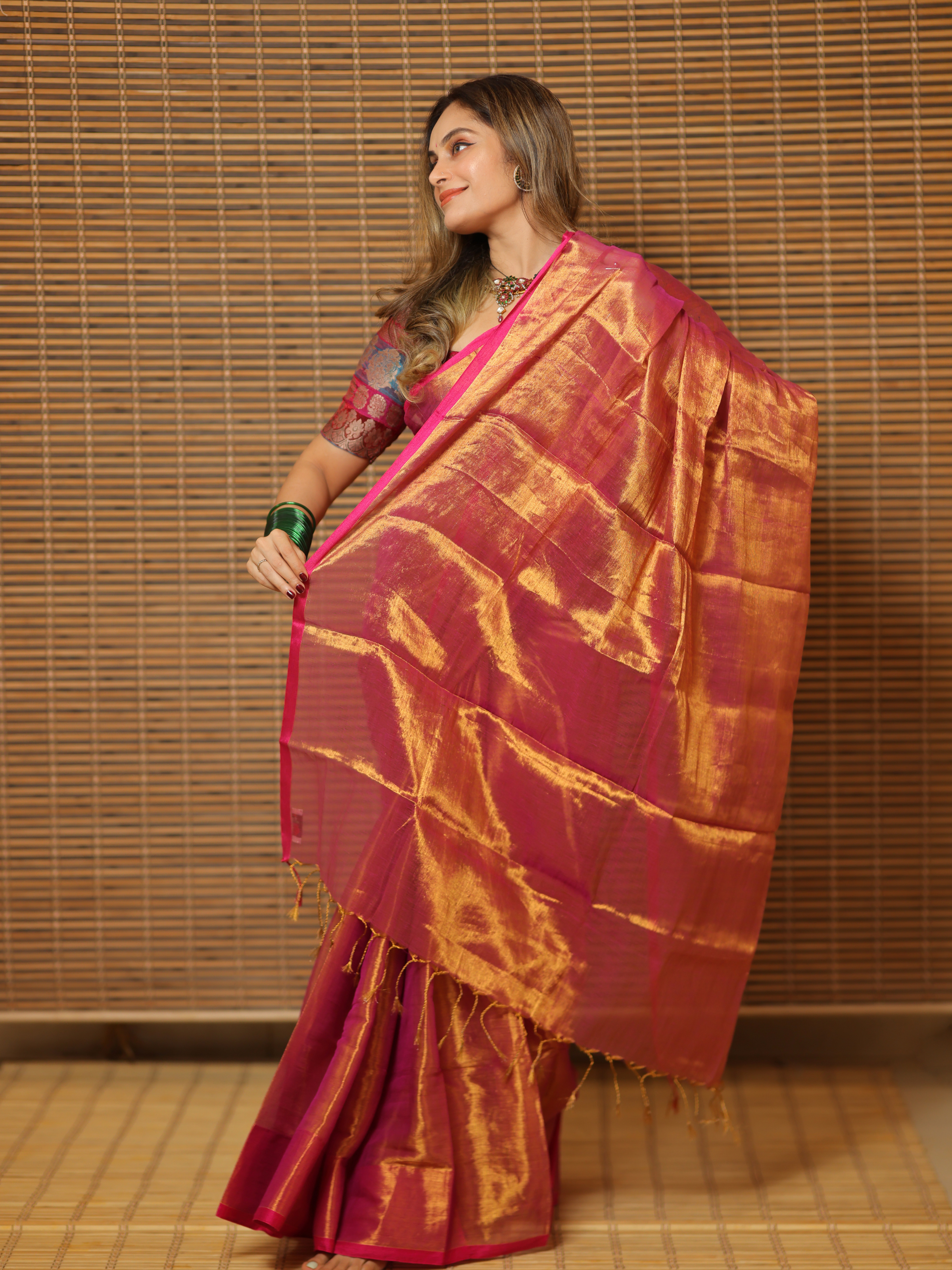 Swarna Utsav (Tissue Mul Saree)